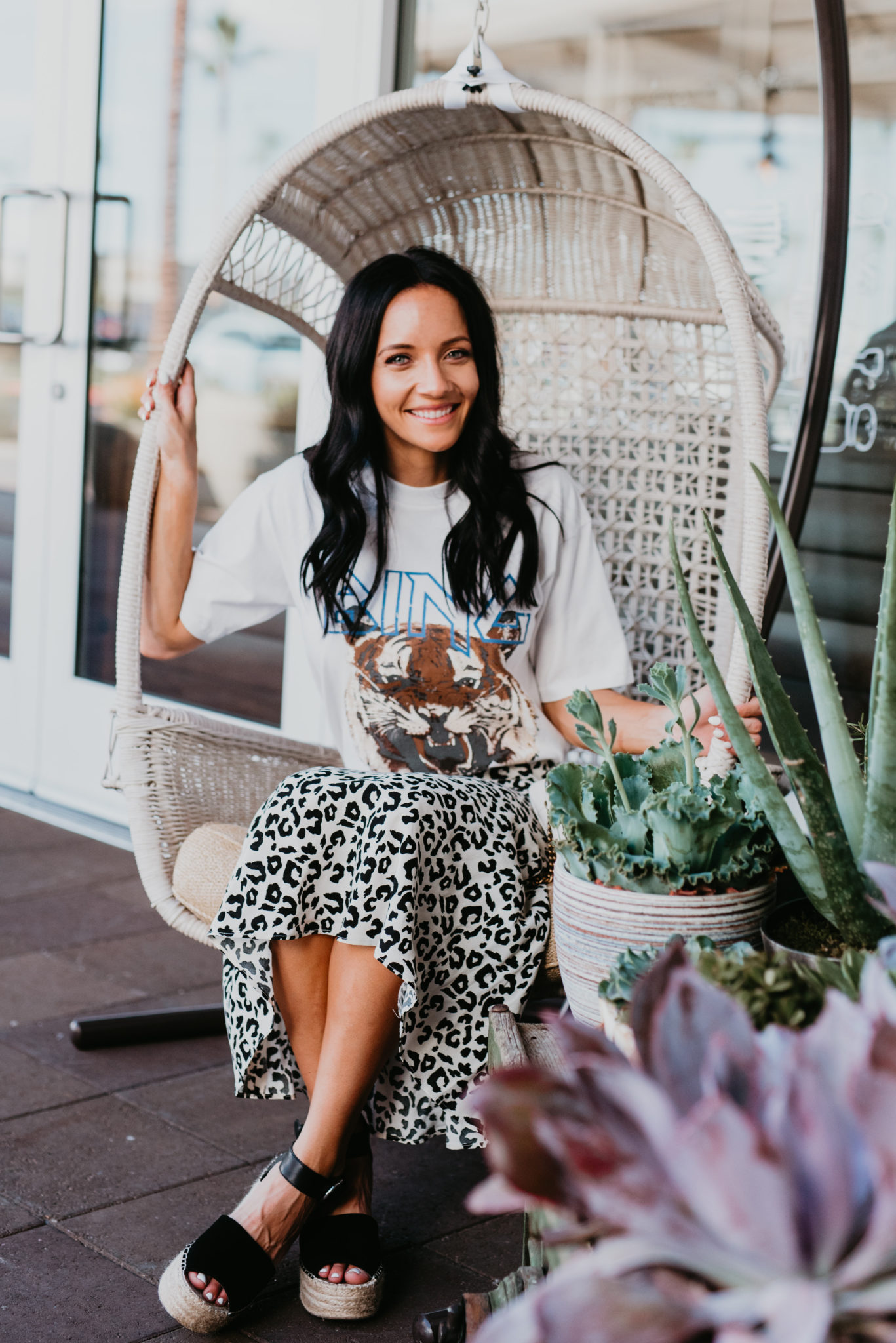 How to Wear a Graphic Tee this Fall, styling tips featured by top US fashion blog, Outfits & Outings: image of a woman wearing an Anime Bing tiger graphic tee, Aqua slip skirt, Gucci GG Marmont Matelasse, Marc Fisher platform wedge espadrilles
