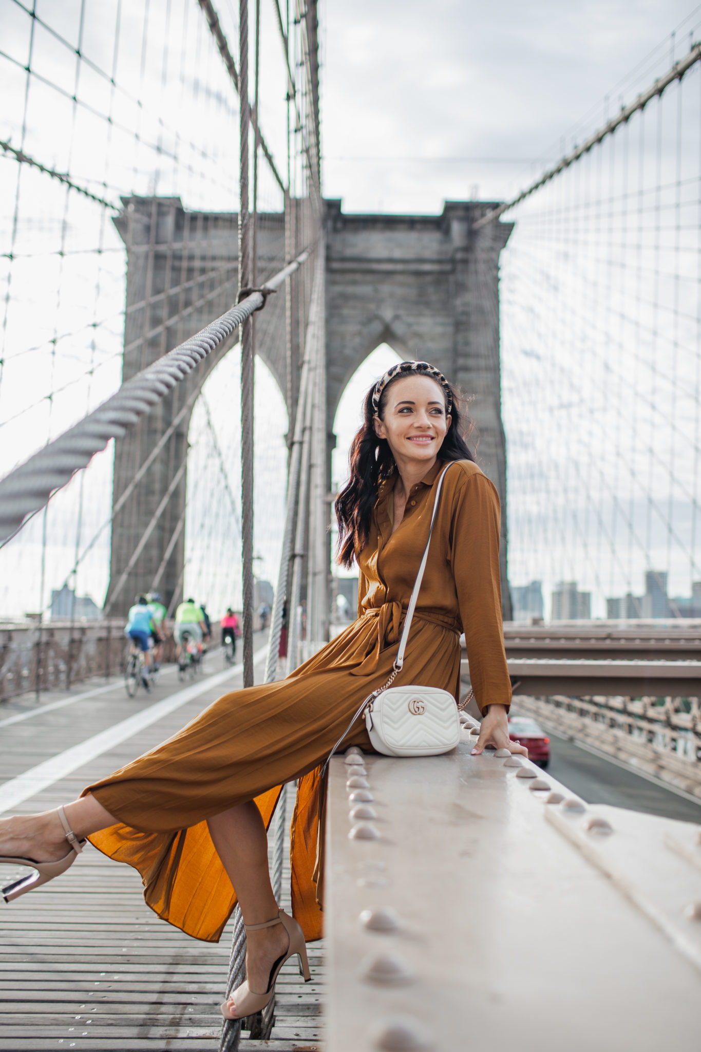 Fall Color Trends featured by top US fashion blog, Outfits & Outings: image of a woman wearing a rust maxi dress