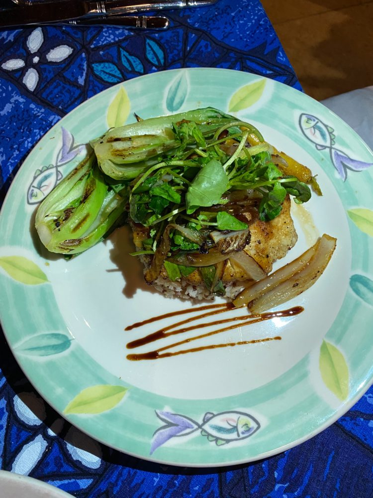 Best Restaurants in Maui by popular Las Vegas travel blog, Outfits and Outings: image of macadamia crusted fish, rice, grilled onions, and bok choy.