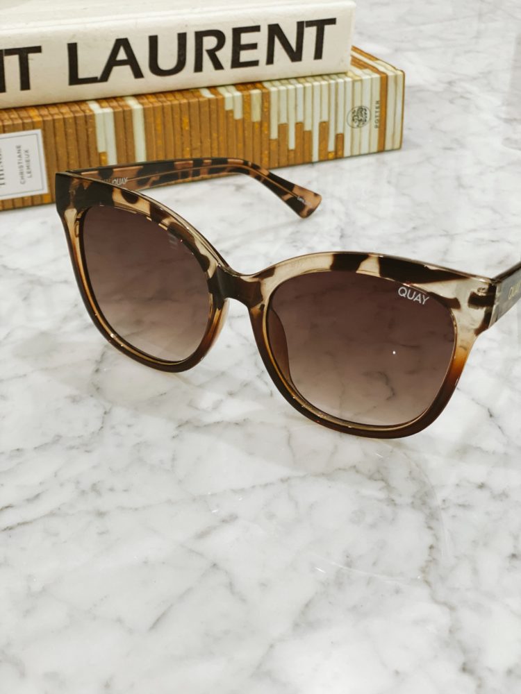 Nordstrom Anniversary Sale 2021 by popular Las Vegas fashion blog, Outfits and Outings: image of a pair of Quay tortoise shell sunglasses. 