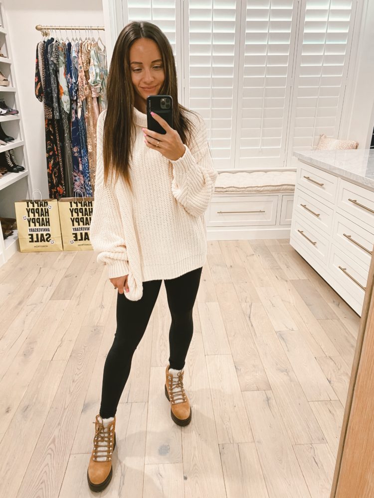  Nordstrom Anniversary Sale 2021 by popular Las Vegas fashion blog, Outfits and Outings: image of a woman wearing a oversize tan knit turtleneck sweater, black leggings, and brown suede combat boots. 