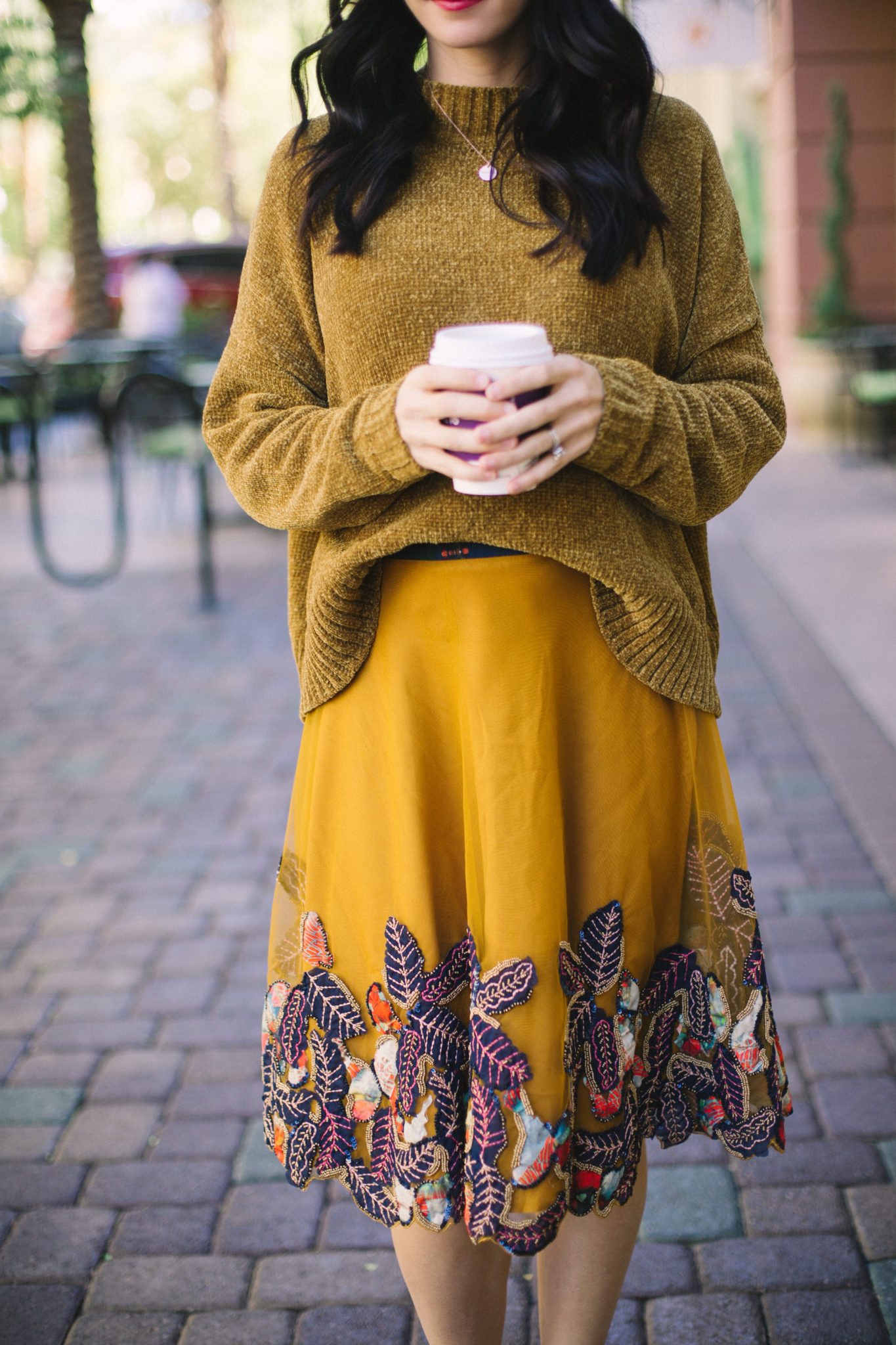 monochromatic outfit gold skirt and gold chenille sweater