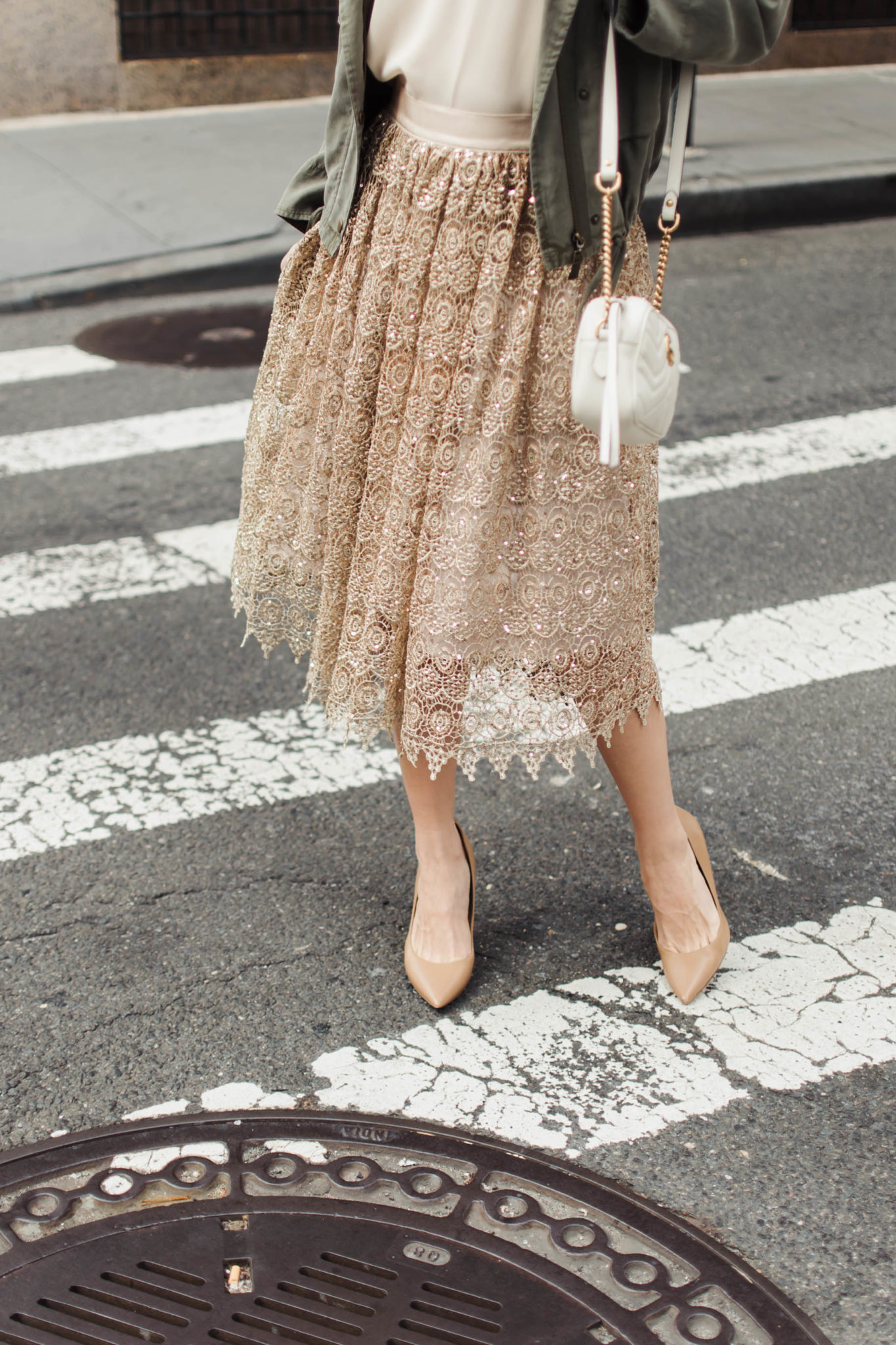 cargo jacket with gold lace skirt and white Gucci marmont bag