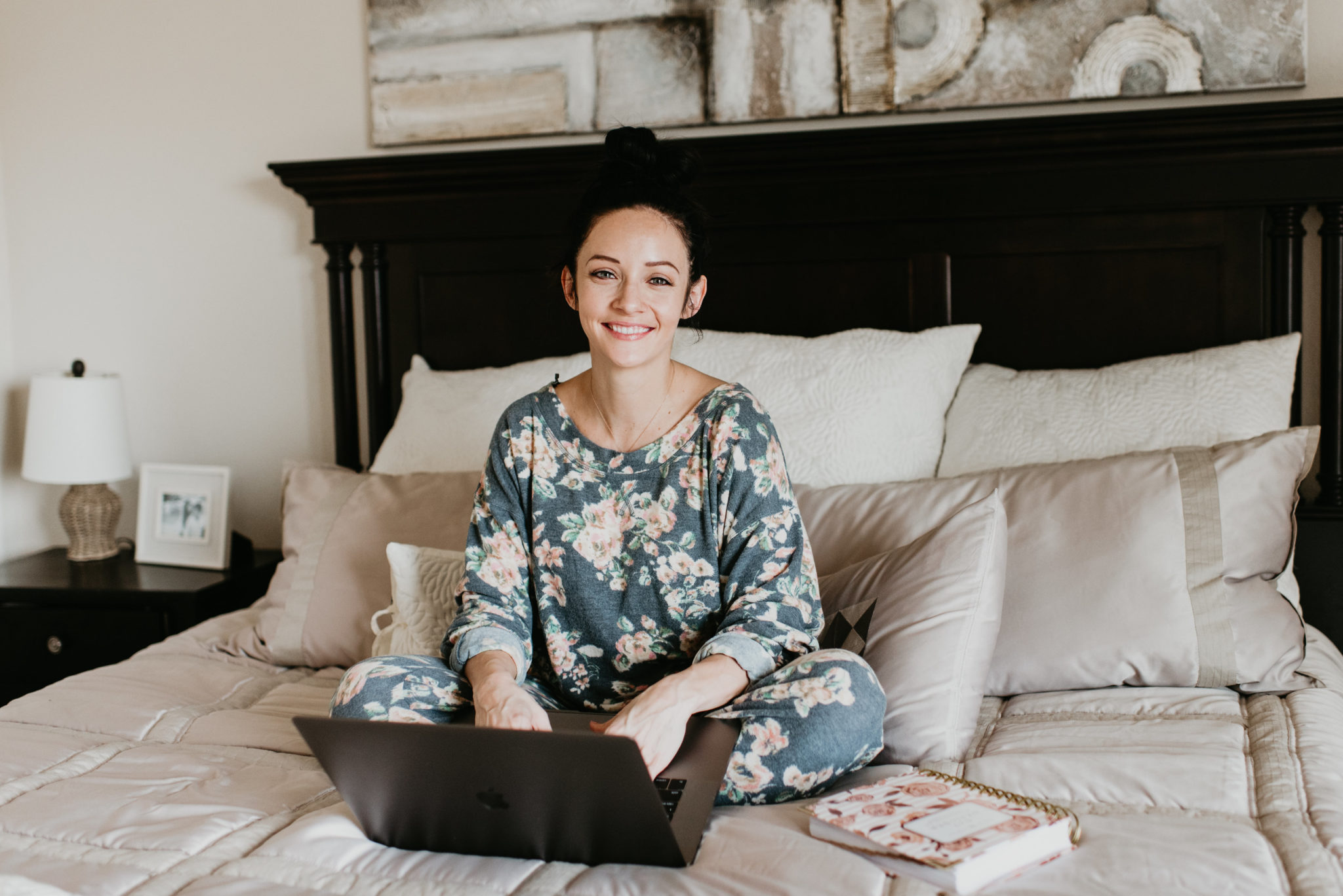 5 Planner Organization Tips for a Successful Year by popular Las Vegas lifestyle blogger Outfits & Outings: image of a woman working on her laptop and looking at her Day Designer planners