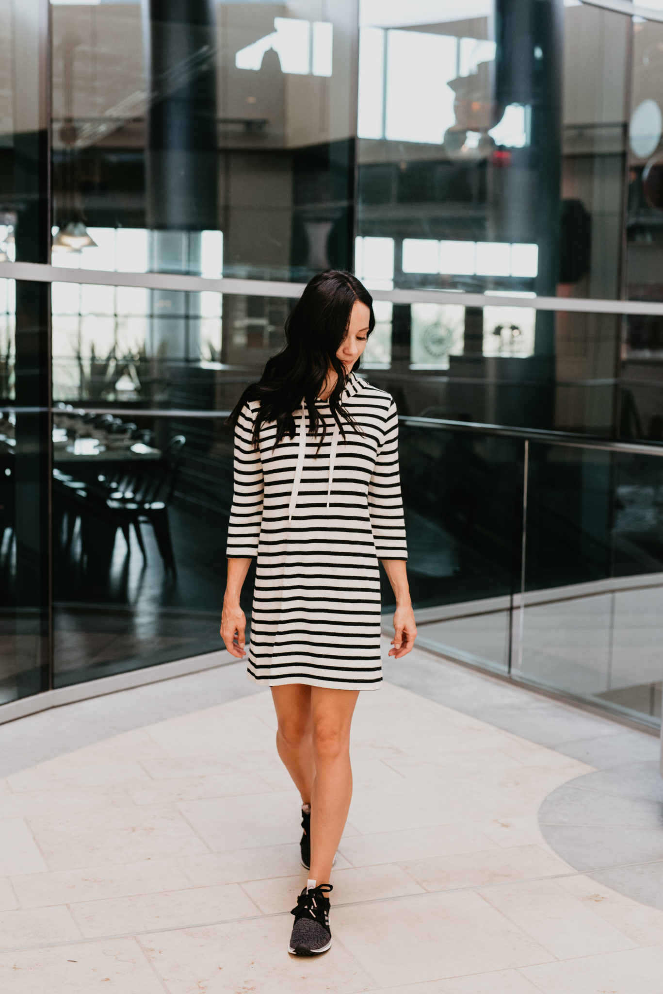 The Best Cyber Week Sales featured by top Las Vegas life and style blog, Outfits & Outings: picture of a brunette woman wearing a striped mini dress
