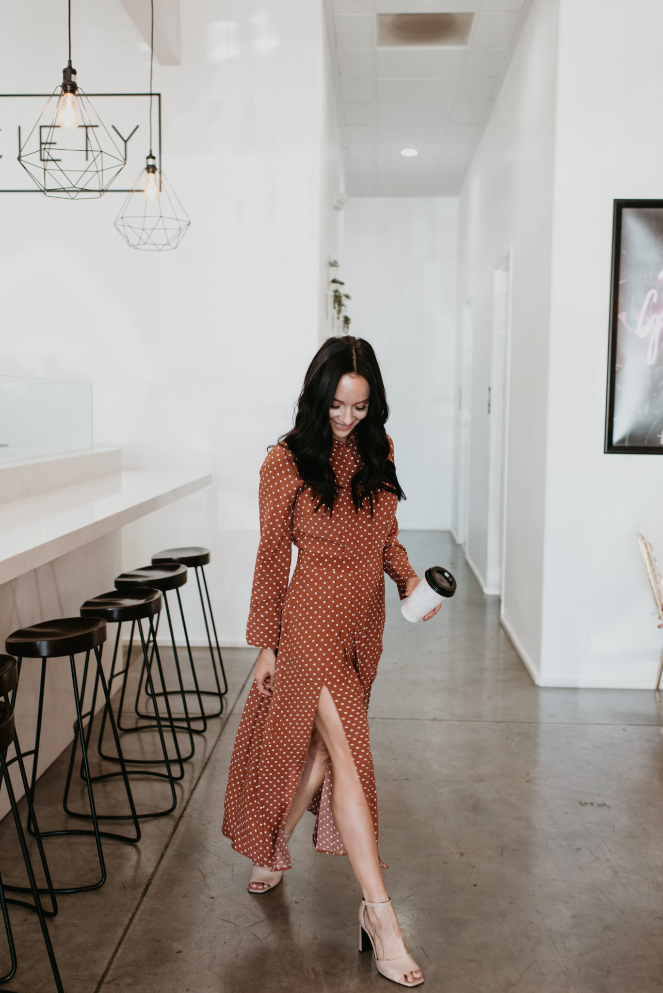 The Best Cyber Week Sales featured by top Las Vegas life and style blog, Outfits & Outings: picture of a brunette woman wearing a maxi polka dot dress