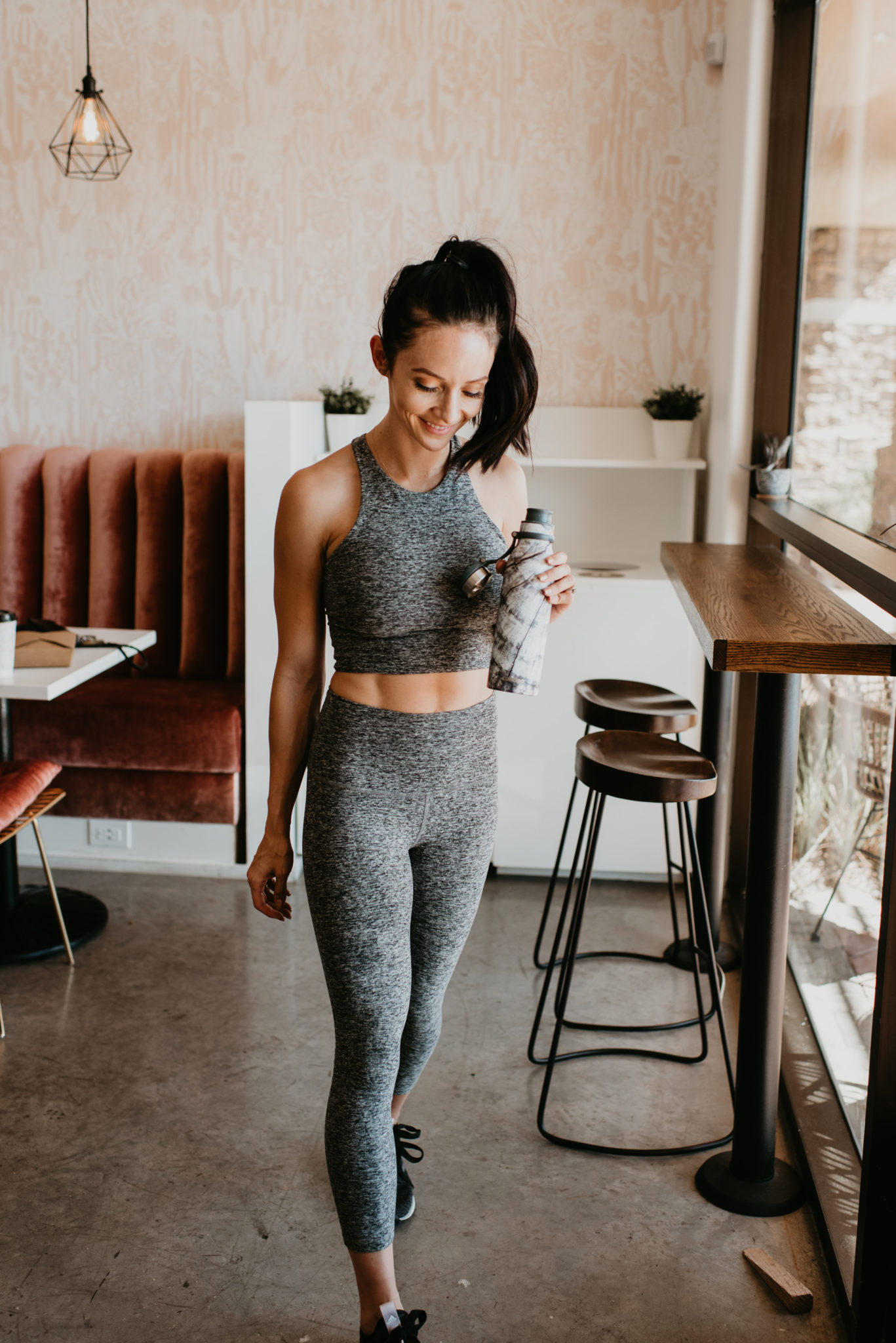 The Best Cyber Week Sales featured by top Las Vegas life and style blog, Outfits & Outings: picture of a brunette woman wearing a workout 2 piece set
