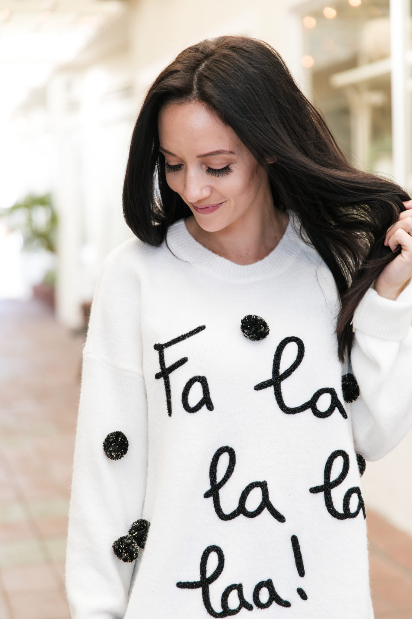 Cute Christmas Sweaters featured by top Las Vegas fashion blog, Outfits & Outings: image of a woman wearing a TOPSHOP Christmas sweater, available at Nordstrom