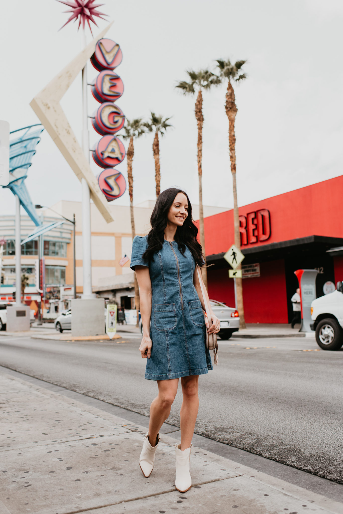 Spring essentials featured by top US fashion blog, Outfits & Outings: image of a woman wearing a Vince Camuto denim dress