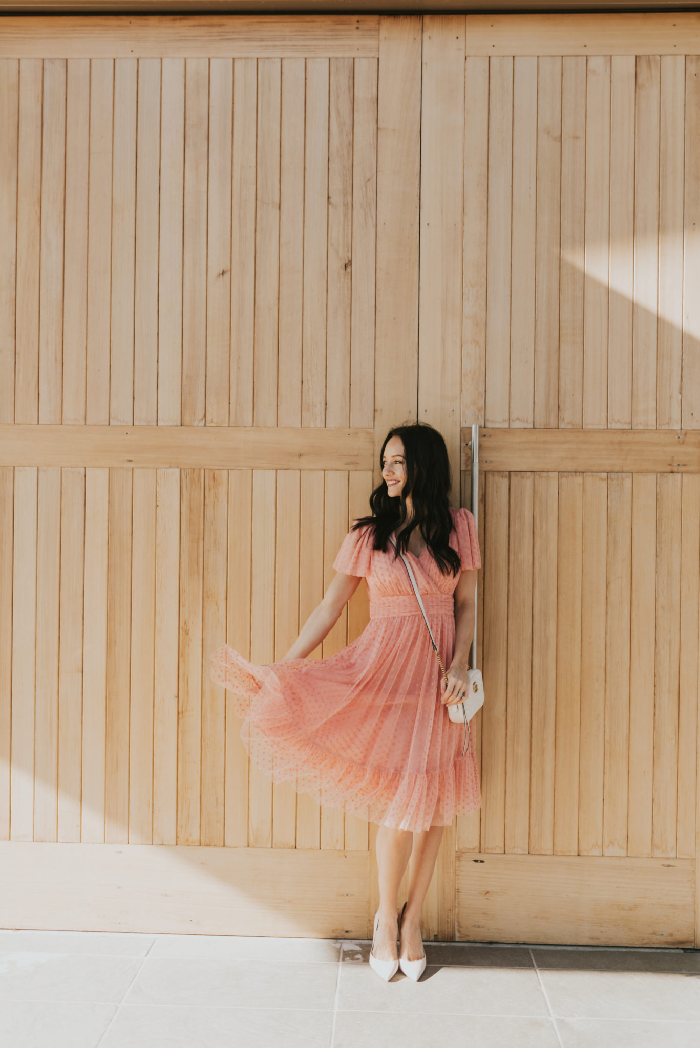 Cute Spring dress look styled by top US fashion blog, Outfits & Outings: image of a woman wearing a pink Gal Meets Glam dress, Jessica Simpson pumps and a Gucci Marmont matelasse