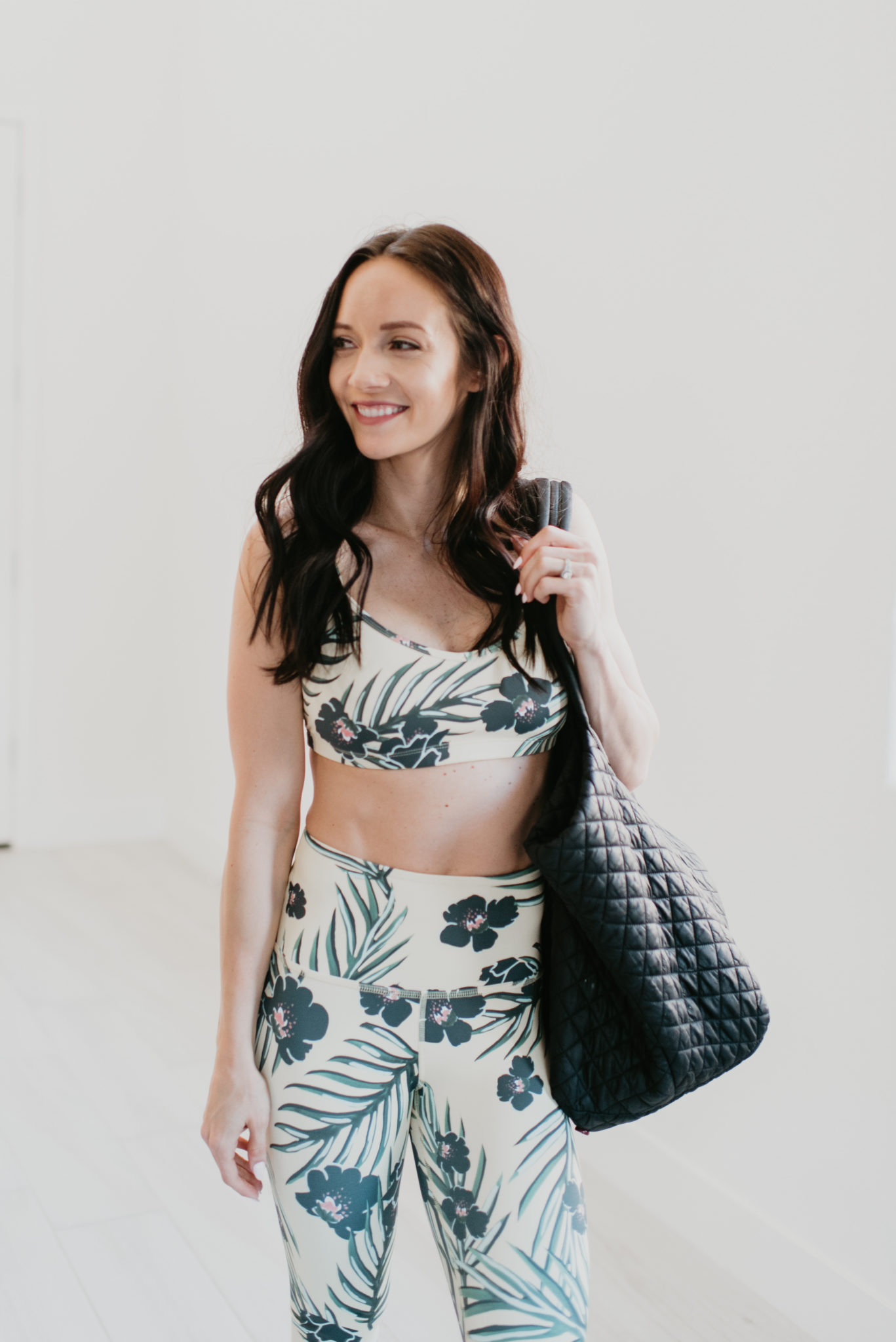 Shopbop Sale favorites featured by top US fashion blog, Outfits & Outings: image of a woman wearing a Beyond Yoga two piece palm print set available at ShopBop