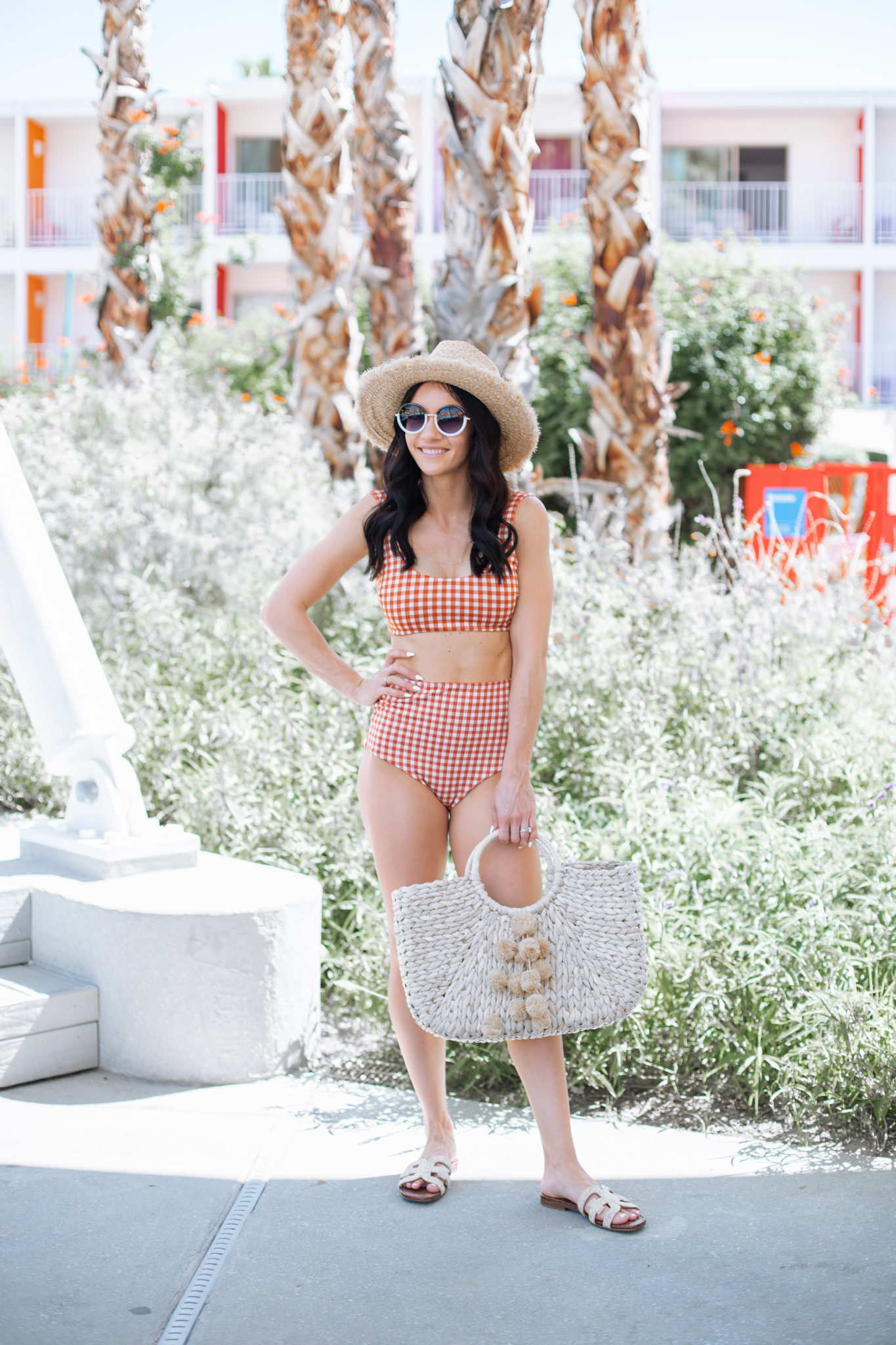 Shopbop Sale favorites featured by top US fashion blog, Outfits & Outings: image of a woman wearing a gingham two piece swimsuit available at ShopBop