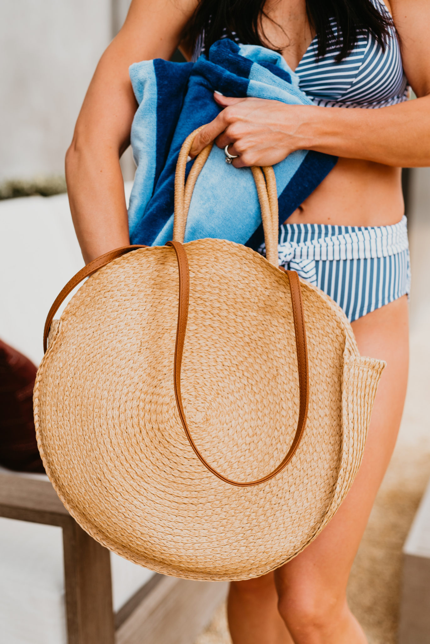 Best Brands at Walmart featured by top US fashion blog, Outfits & Outings: image of a woman wearing a Time and Tru striped bikini, Time and Tru straw circle tote, Time and Tru sandals, Time and Tru straw floppy hat, and Mainstay striped beach towel