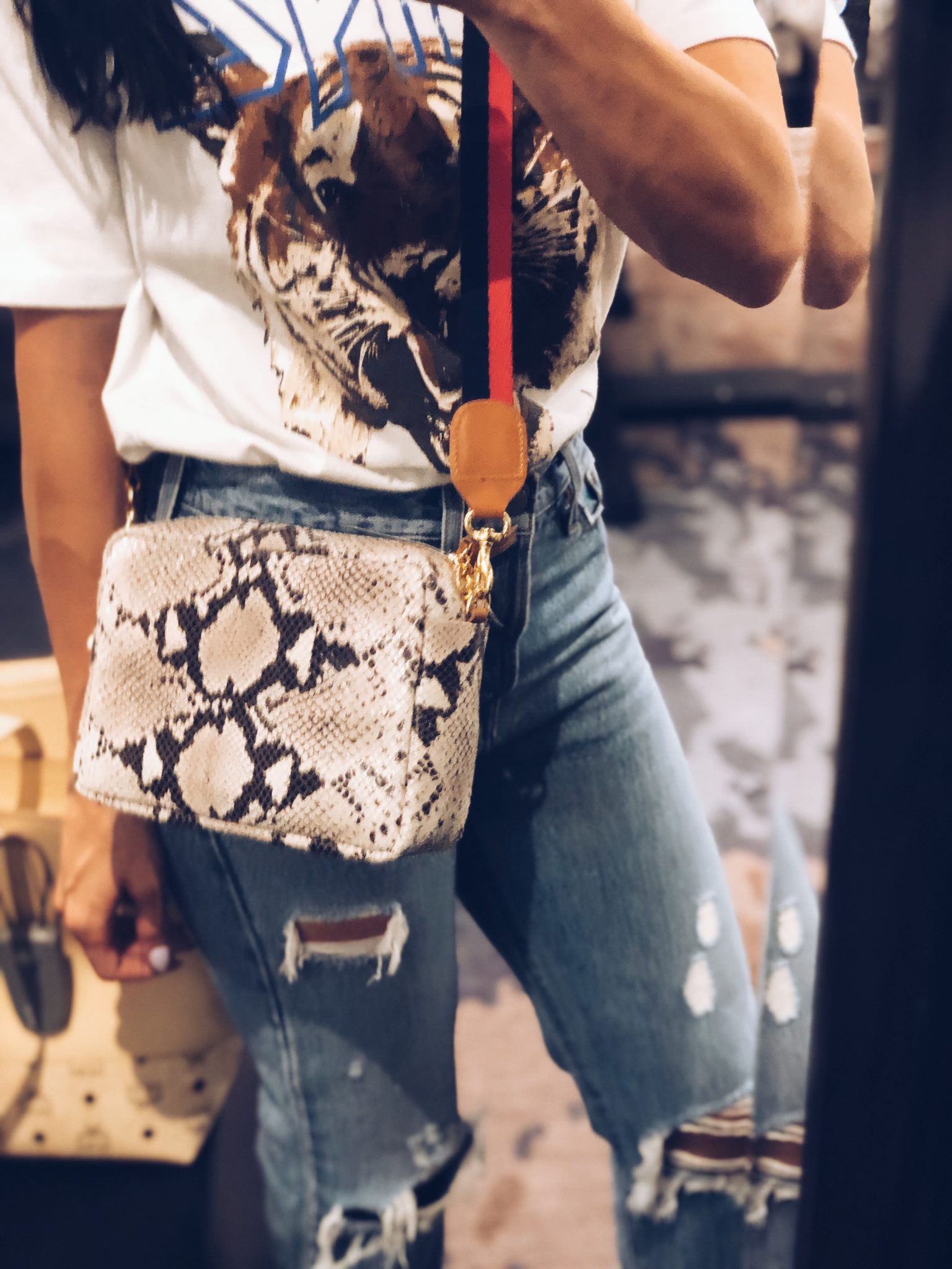 Nordstrom Anniversary Sale Sneak Peek featured by top US fashion blog, Outfits & Outings: snake print crossbody bag on sale