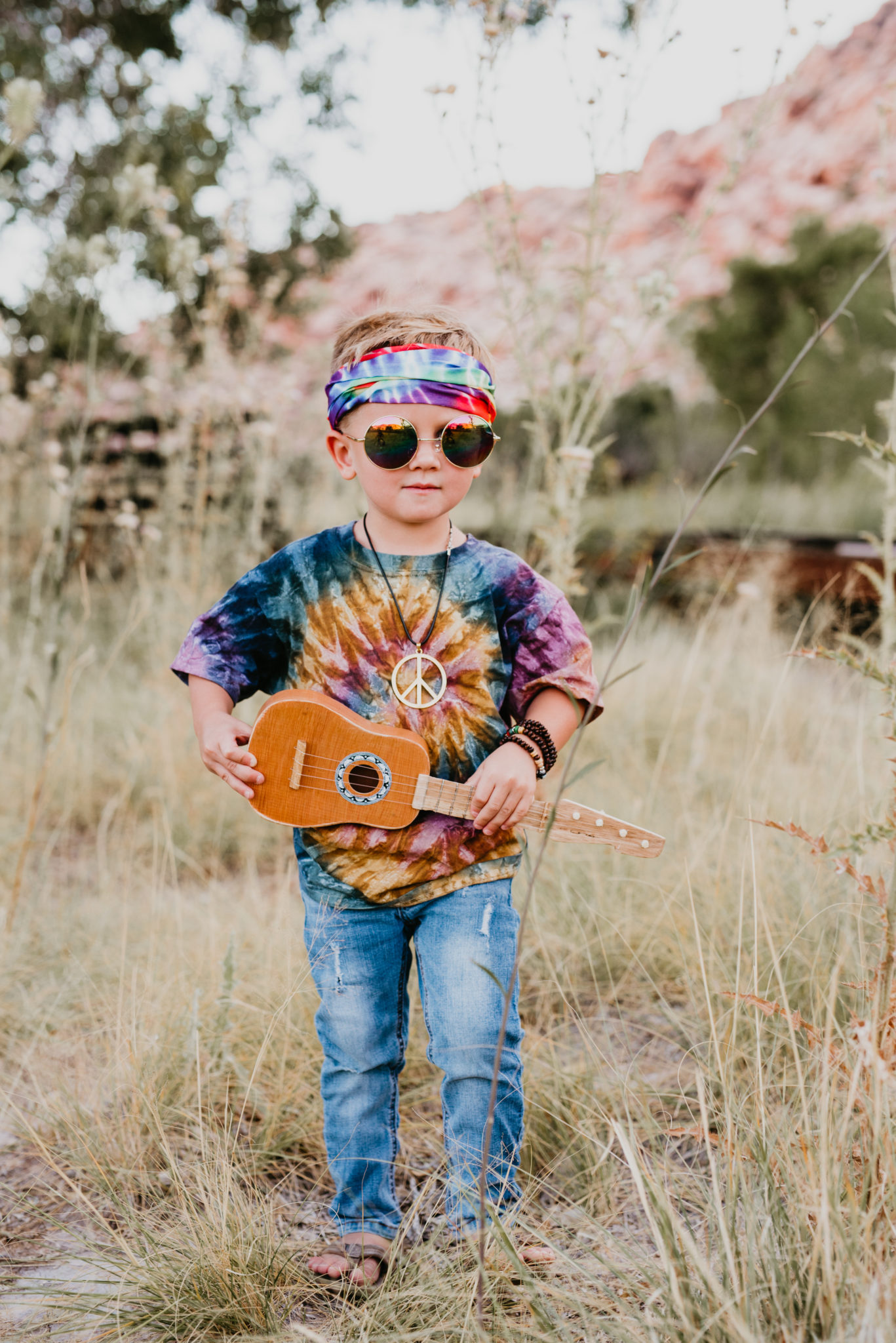 DIY Hippie Costume Ideas for Halloween featured by top US life and style blog, Outfits & Outings: image of a family dresses up as hippies