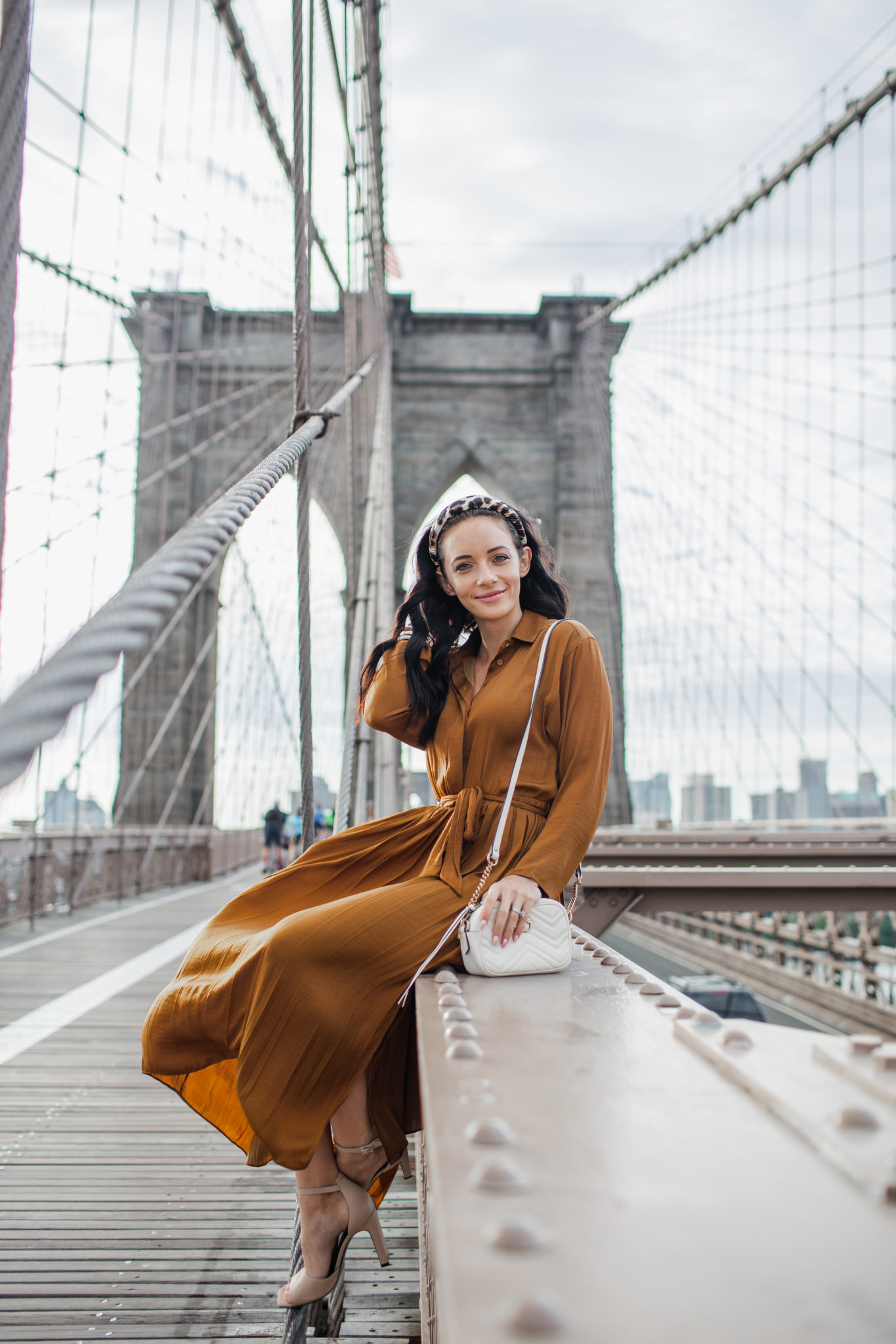 Fall Color Trends featured by top US fashion blog, Outfits & Outings: image of a woman wearing a rust maxi dress