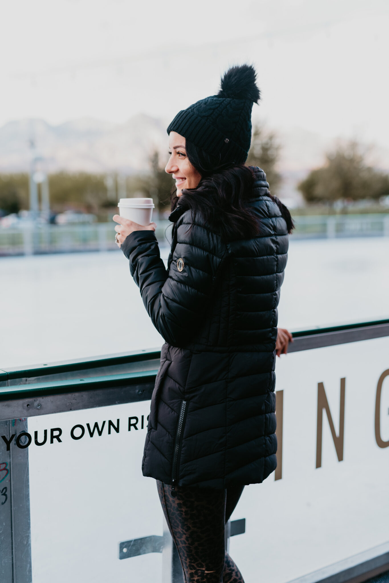  Must Have Cute Bernardo Coats for Women featured by top US fashion blog, Outfits & Outings: image of a woman wearing the Bernardo Ecoplume Commuter packable Jacket 