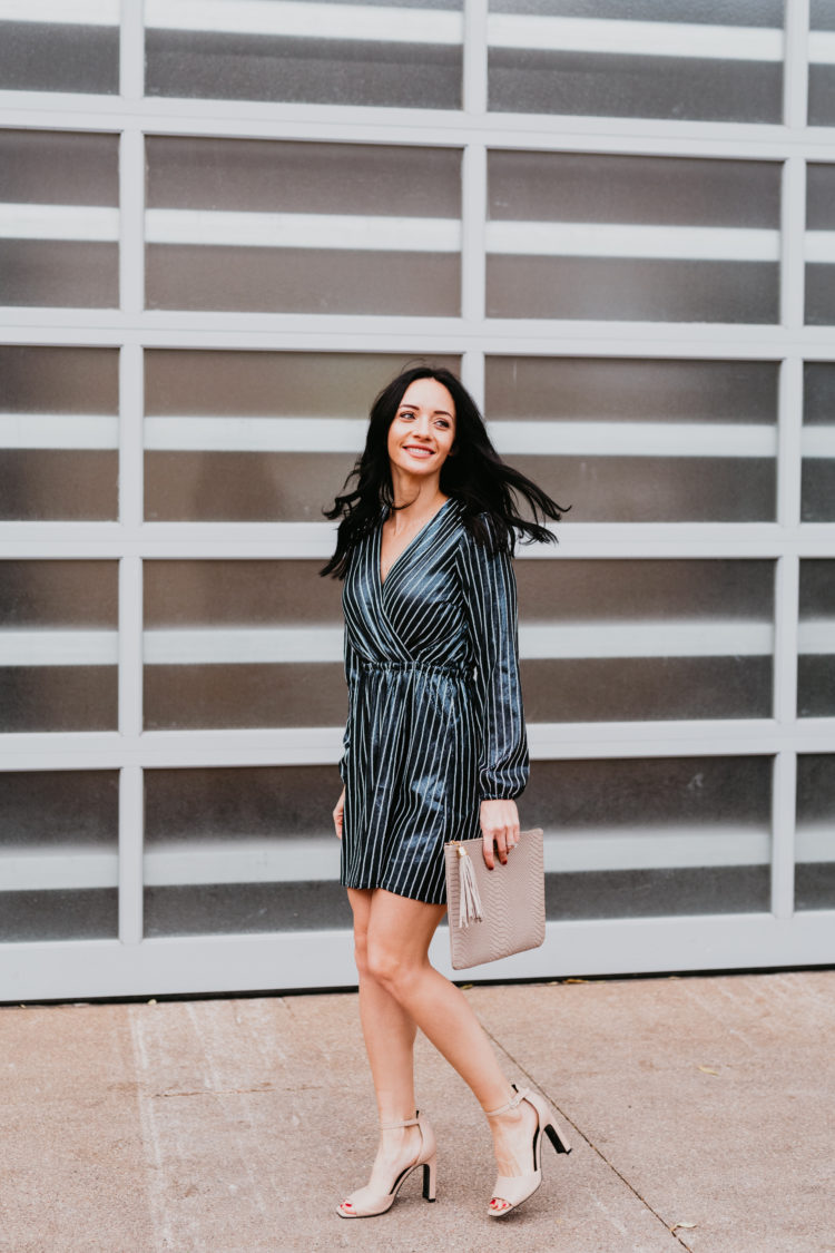 24 Sparkly NYE Dresses featured by top US fashion blog, Outfits & Outings: image of a woman wearing an ASOS sparkly striped mini dress
