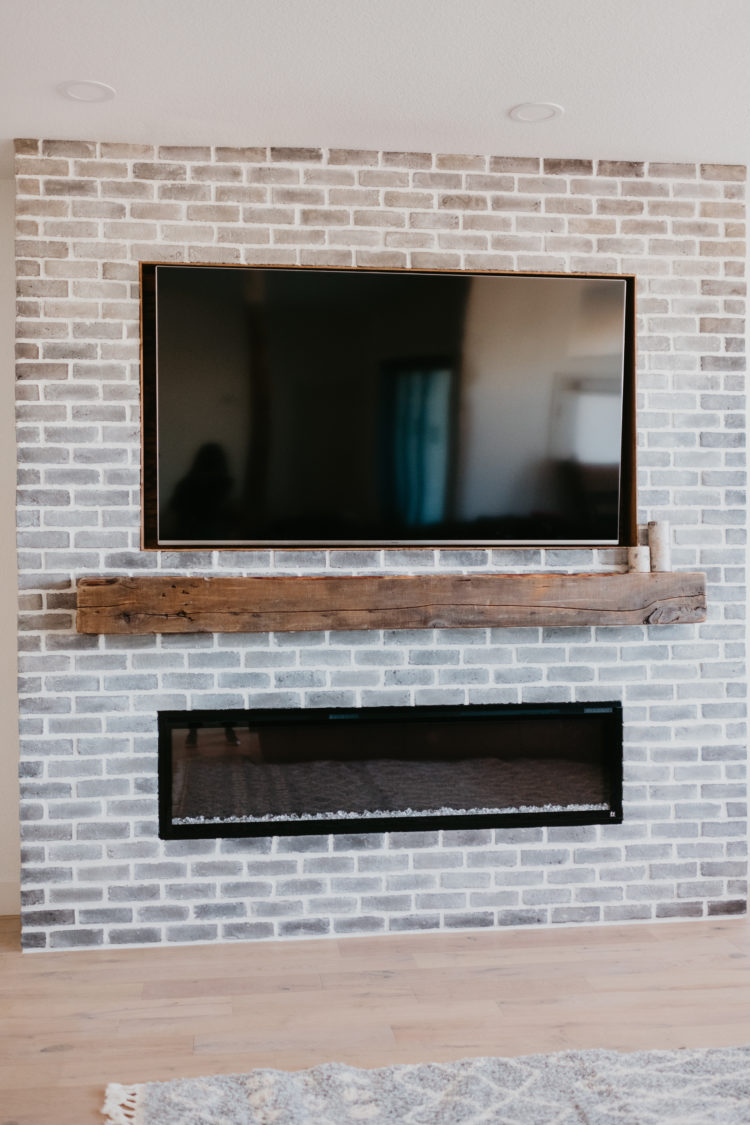 Gray Brick Fireplace home project featured by top Las Vegas lifestyle blog, Outfits & Outings.