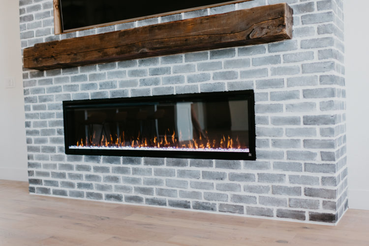 Gray Brick Fireplace home project featured by top Las Vegas lifestyle blog, Outfits & Outings.