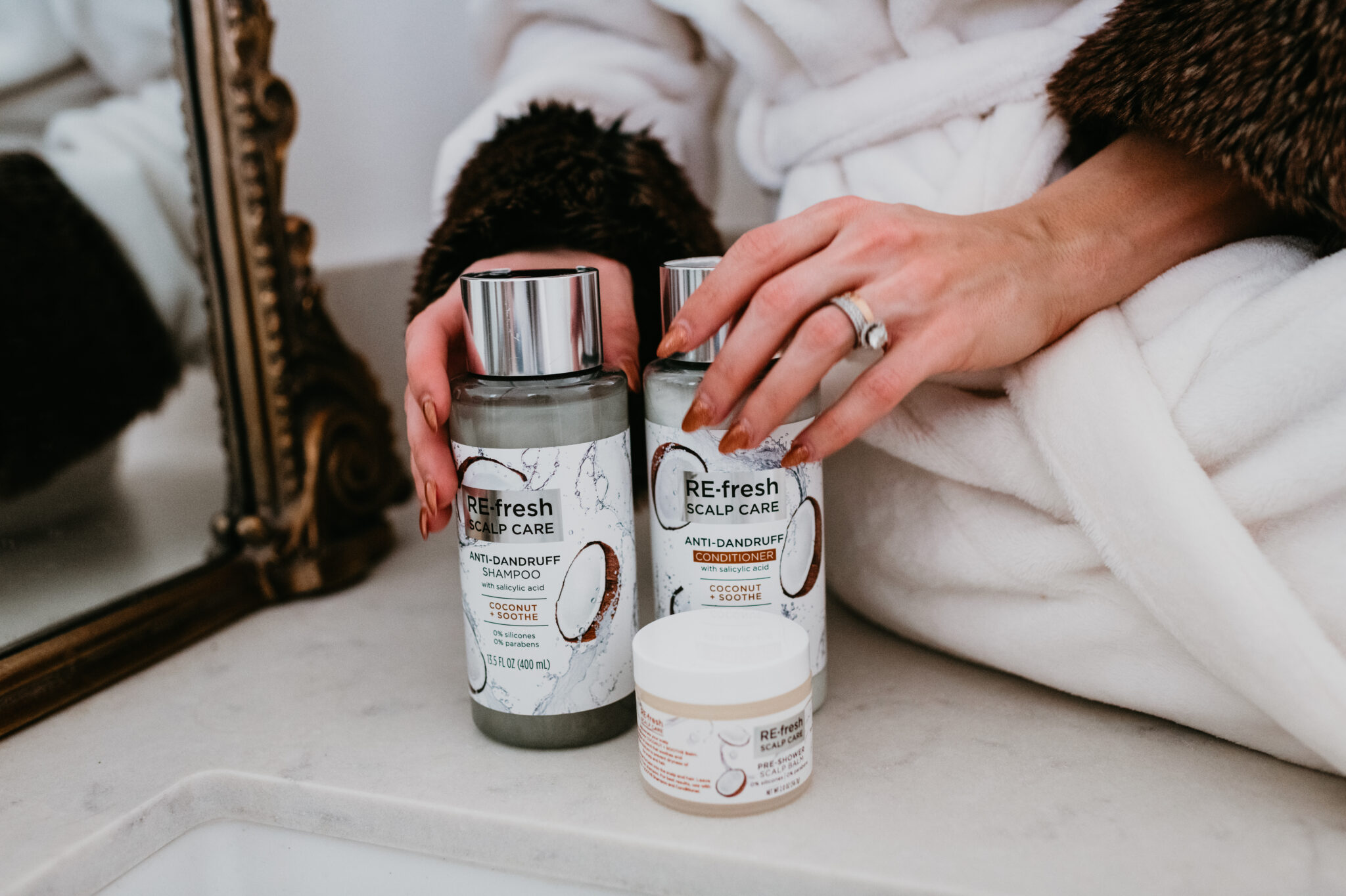 Re-fresh scalp care review: the best products for dandruff. A review featured by top Las Vegas beauty blog, Outfits and Outings | Re-Fresh Scalp Care by popular Las Vegas hair and beauty blog, Outfits and Outings: image of Re-Fresh Scalp Care anti-dandruff shampoo and conditioner. 
