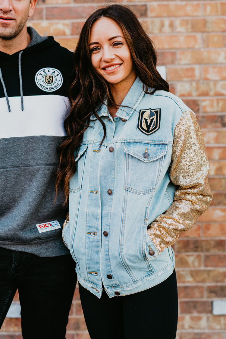 Golden Knights Gear by popular Las Vegas fashion blog, Outfits and Outings: image of a woman wearing a gold sequin sleeve Golden Knights denim jacket. 