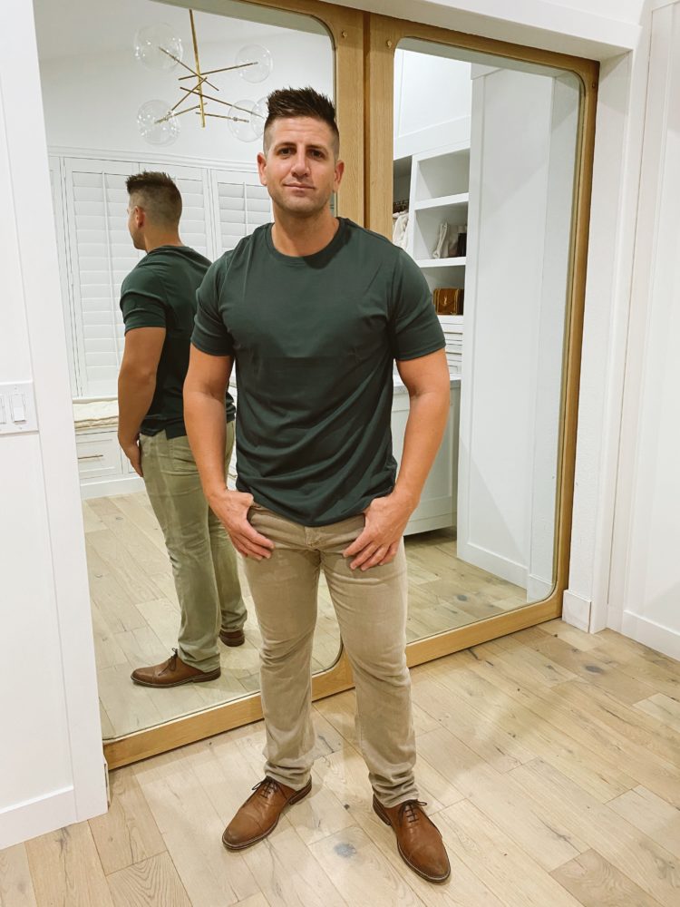 Nordstrom Anniversary Sale 2021 by popular Las Vegas fashion blog, Outfits and Outings: image of a man wearing a dark green t-shirt, tan pants, and brown dress shoes. 