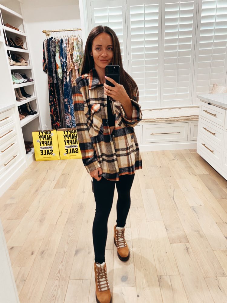 Nordstrom Anniversary Sale 2021 by popular Las Vegas fashion blog, Outfits and Outings: image of a woman wearing a plaid shacked, black leggings, and brown suede combat boots. 