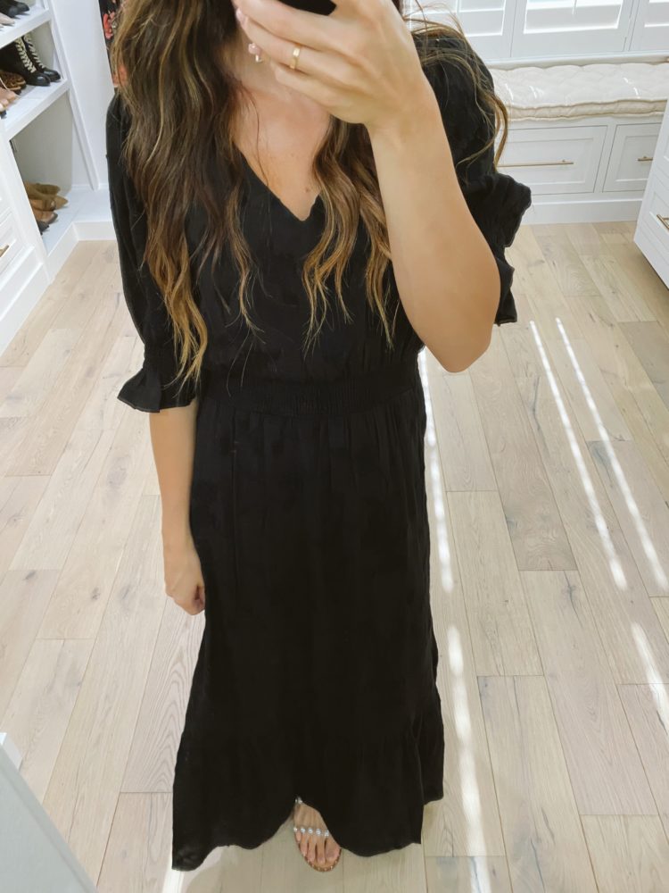 Nordstrom Anniversary Sale 2021 by popular Las Vegas fashion blog, Outfits and Outings: image of a woman wearing a black tiered maxi dress with clear studded strap sandals. 